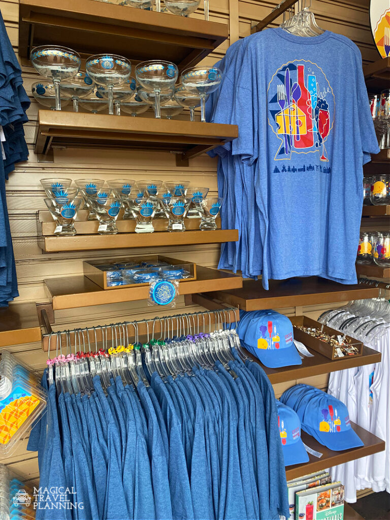 Festival Merchandise for the Food and Wine Festival at EPCOT including shirts, hats, magnets, and glasses